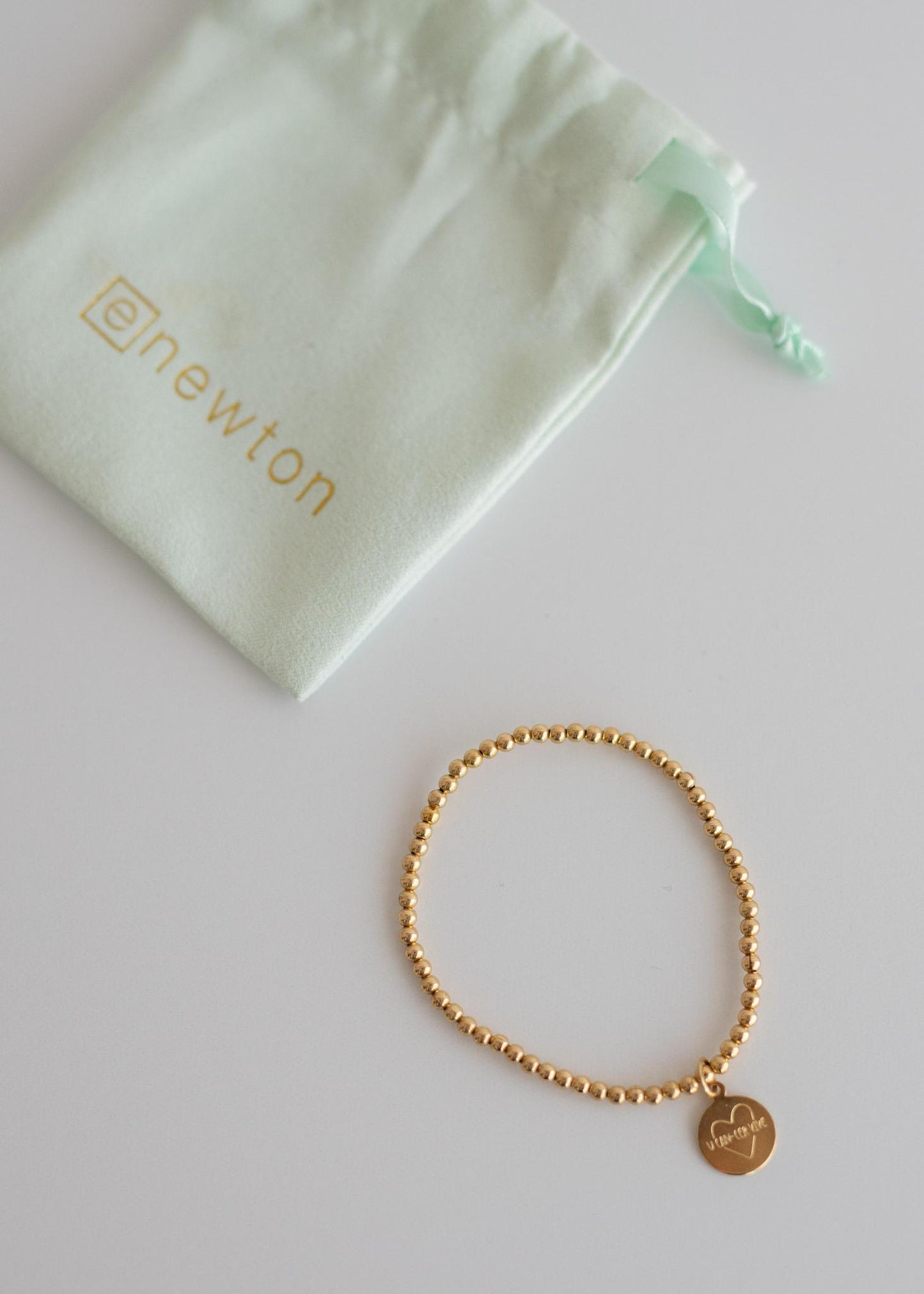 enewton Gold Charm Bracelet